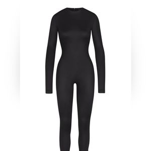 All in one shine crew neck long sleeve onesie.